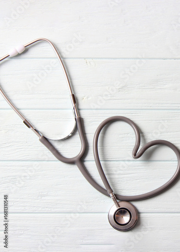 stethoscope on color background close-up. Health, medicine. Vertical photo format