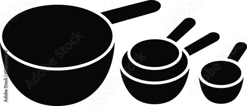 Set of three black measuring cups on a white background