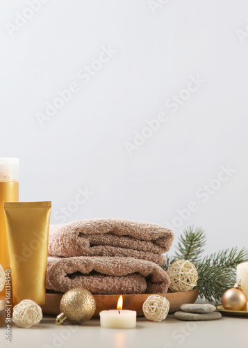 Wallpaper Mural spa composition on the table and Christmas accessories. Skin care. Vertical photo format Torontodigital.ca