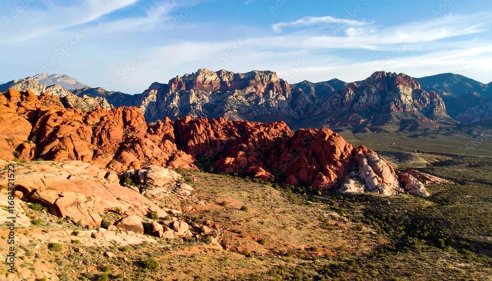 Fototapeta premium A vast landscape of red rock mountains and desert