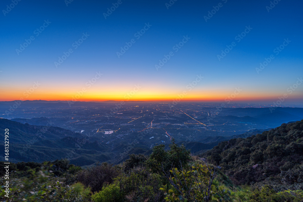 Fototapeta premium Panorama view of Beijing sunrise from Western Hills Miaofengshan area