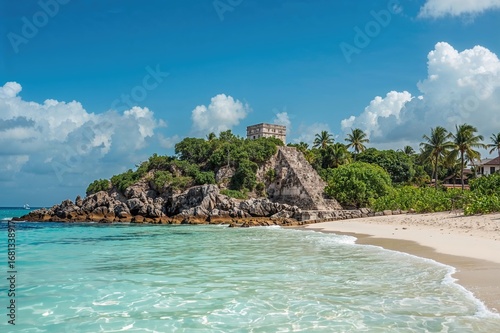 Wallpaper Mural Ancient stone structures with ocean backdrop under clear blue sky, sandy shore, and vibrant summer vibes Torontodigital.ca