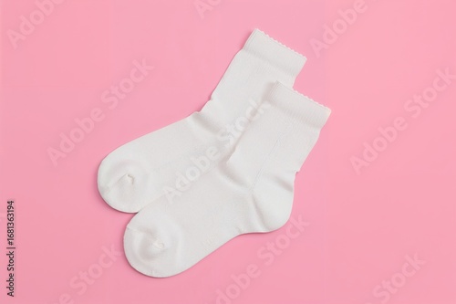 Flat lay of two white socks...