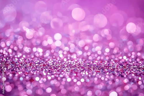 Blurred purple sparkling li...