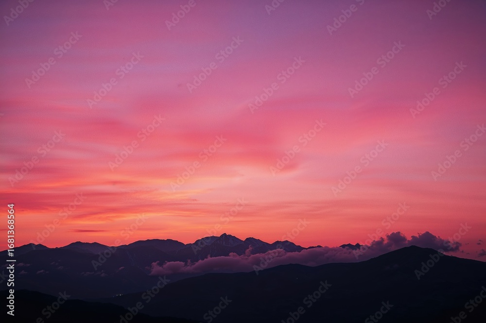 Fototapeta premium Magenta twilight behind the hills