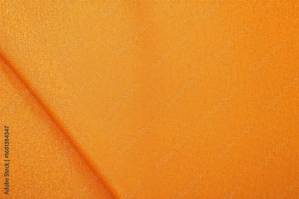 Fototapeta premium Seamless natural textile pattern featuring orange fabric texture
