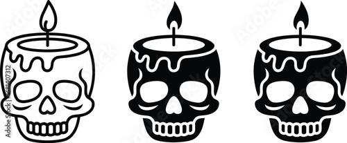 Three skull candles burning for halloween spooky decoration art