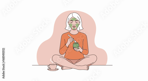Young Woman with Green Facial Mask and Orange Sweater Sitting Cross-Legged, Applying Skincare in a Relaxing Home Environment, Promoting Self-Care, Wellness, Beauty Routines, and Spa Treatments for