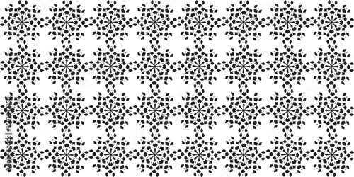 Seamless repeating intricate black and white geometric floral dot pattern design symmetrical and abstract.