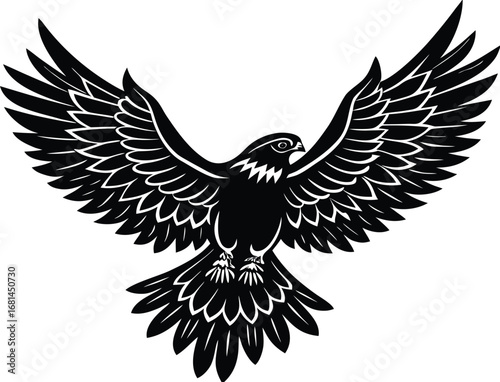 Black silhouette of a majestic falcon with wings spread wide