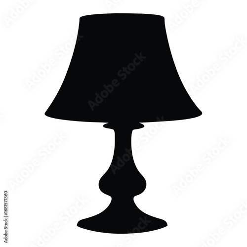 Silhouette of a table lamp with a fancy base and lampshade