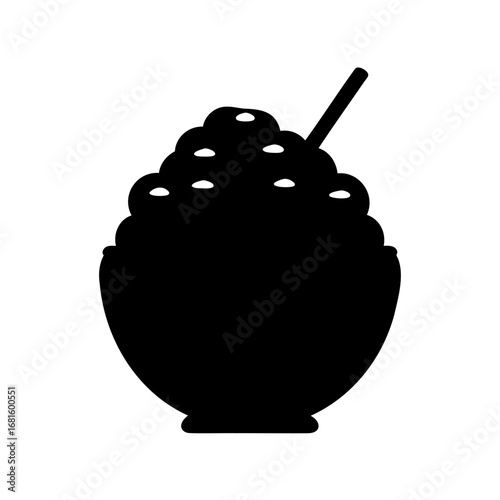 Silhouette image of a bowl of shaved ice with a spoon