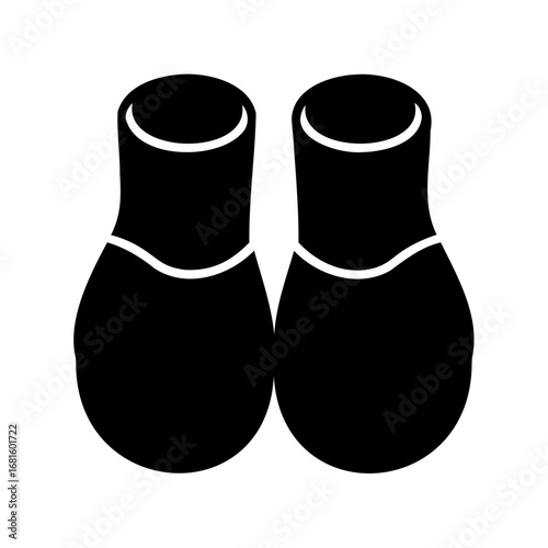 Two black slippers footwear for indoor use with a white border
