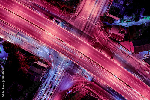 Expressway, Self-driving autonomous electric cars of the future with elements move along a busy traffic intersection. Artificial Intelligence, Car Scan, GPS Tracking, Smart Roads, IoT, highway