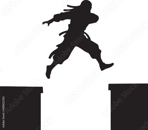 Black silhouette of a ninja leaping over a gap between two platforms jumping action