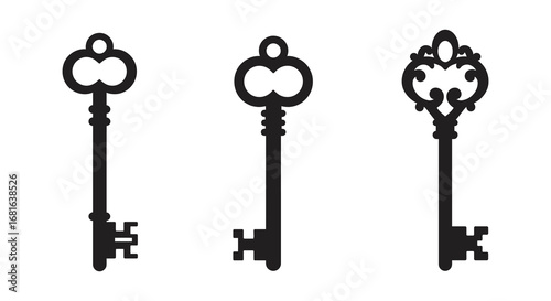 three antique keys displayed side by side