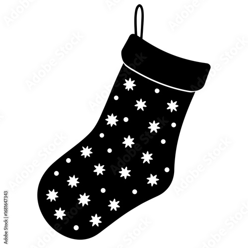 Black Christmas stocking with stars and dots hanging