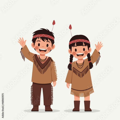 Two cheerful young children dressed in traditional indigenous american outfits waving happily