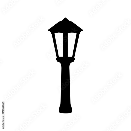 Silhouette of a classic street lamp, a symbol of old town charm