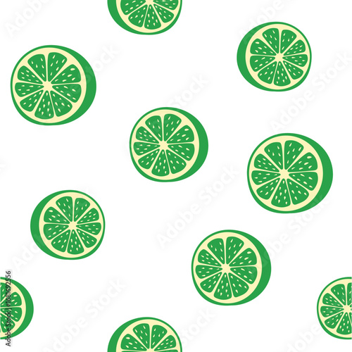 Bright green lime slices scattered on a white background create a playful and fresh pattern in a contemporary design