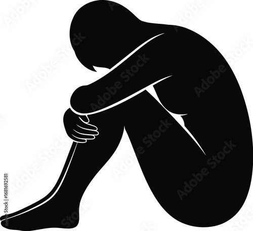 Silhouette of a depressed woman sitting with her head in her hands, concept of sadness, loneliness, and mental health issues