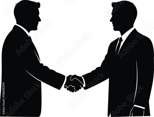 Silhouette of two businessmen shaking hands in agreement, symbolizing a successful deal and partnership