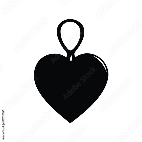 Elegant black heart pendant with bail casting a simple shadow behind