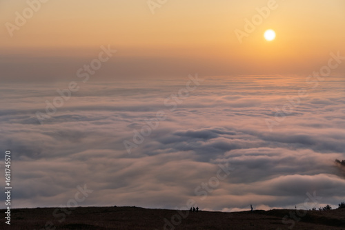 Golden Sunset Over the Clouds