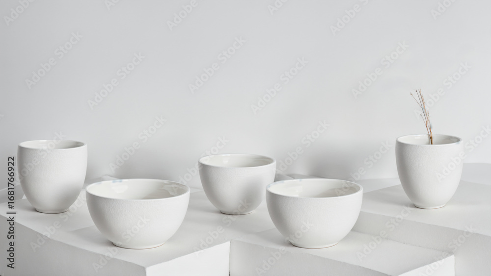 Fototapeta premium White ceramic bowls on white background