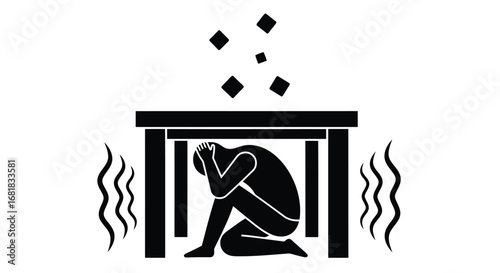 Person under table during earthquake