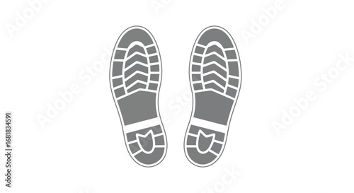 Two shoe footprints, indicating direction or path