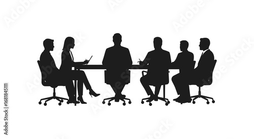Business people sitting at a conference table in a meeting