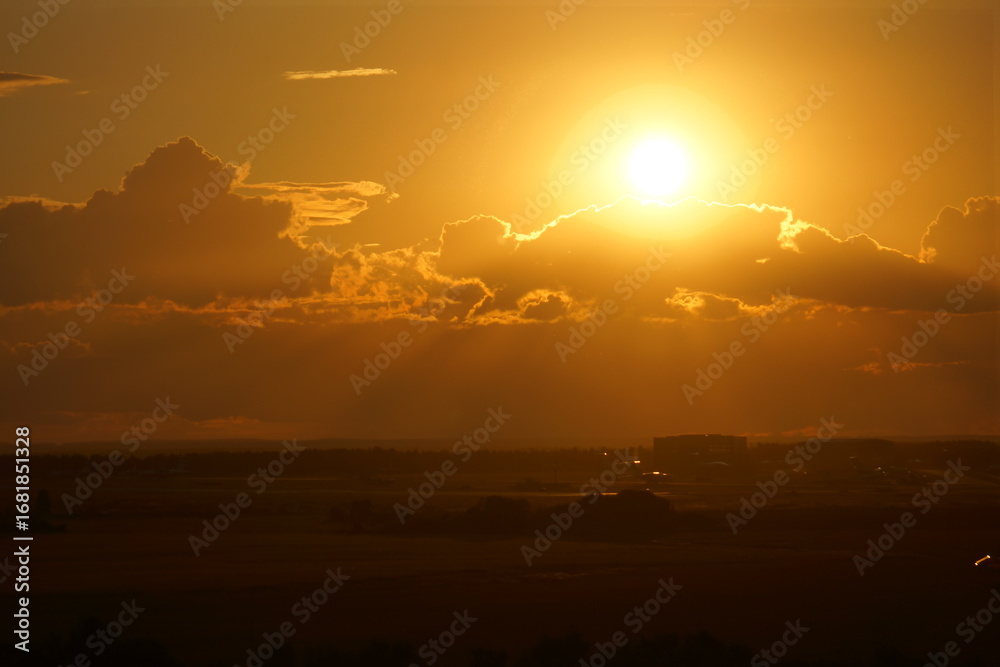 Obraz premium sunset over the river