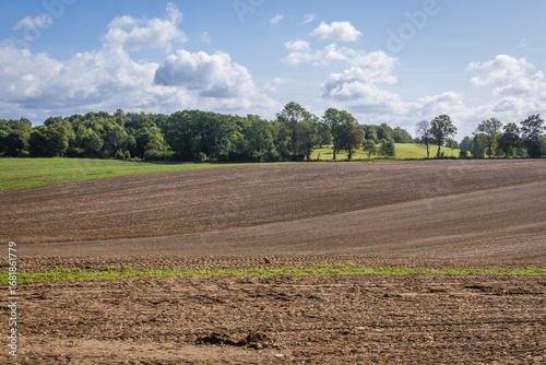 Fototapeta Naklejka Na Ścianę i Meble -  View on the plowed fields near Ornowo, small village near Ostroda town in Poland