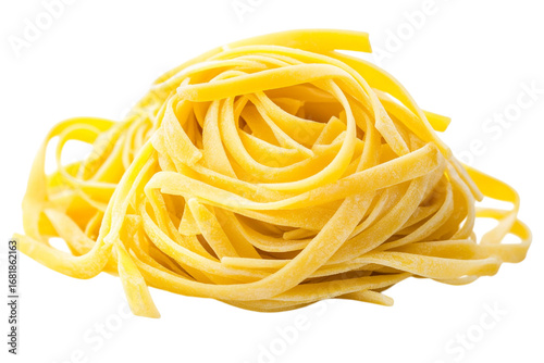 Golden nest of fresh tagliatelle pasta isolated on a stark black background food photography