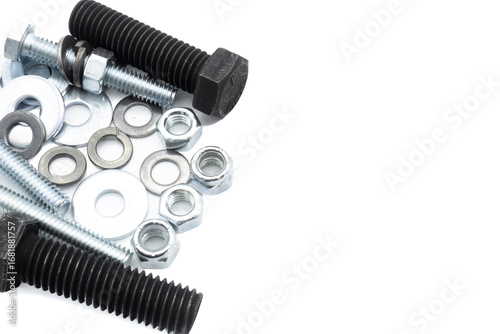 Set of screws of different types, allen, grade 5, hexagonal millimeter, eye bolts, washers, dowel, car screw, clamps on white background copy space	