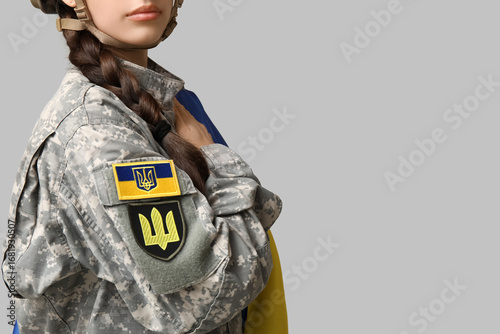 Female soldier in uniform w...