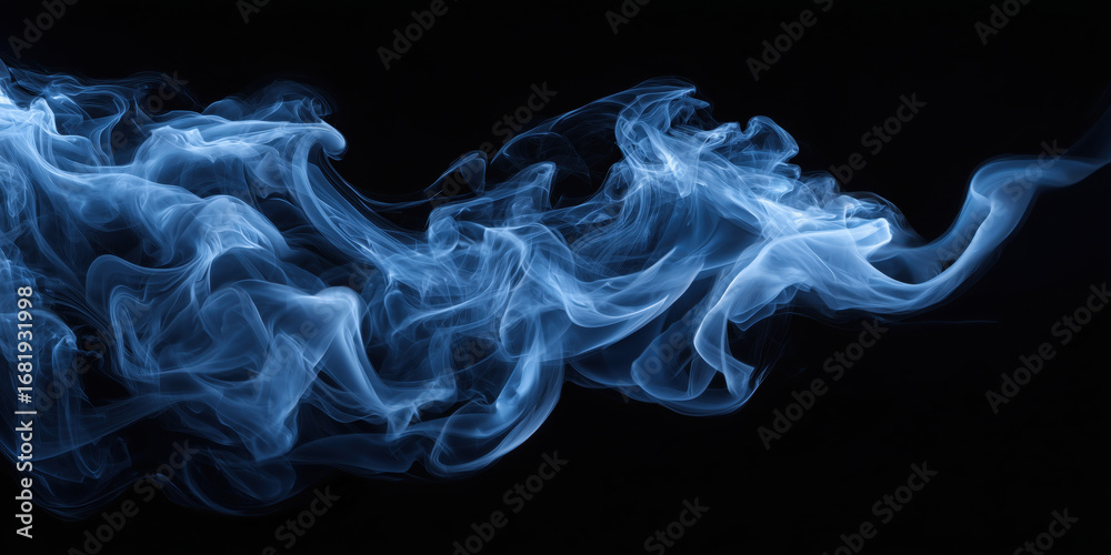 Fototapeta premium Blue smoke flowing on black background
