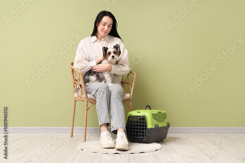 Young woman sitting in a wi...