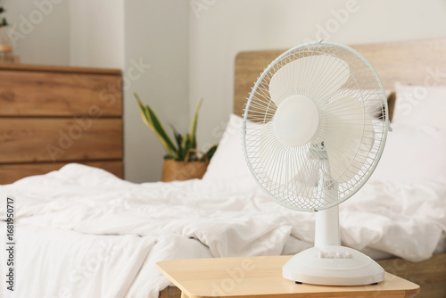 White electric table fan on...