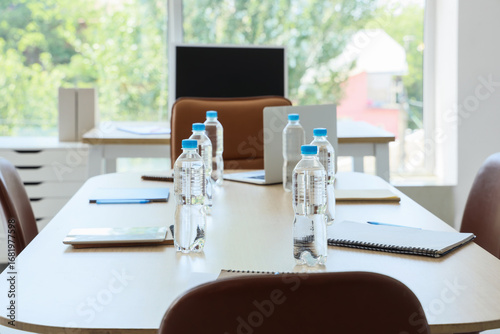 Table with bottles of water...
