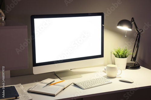 Workplace with blank comput...