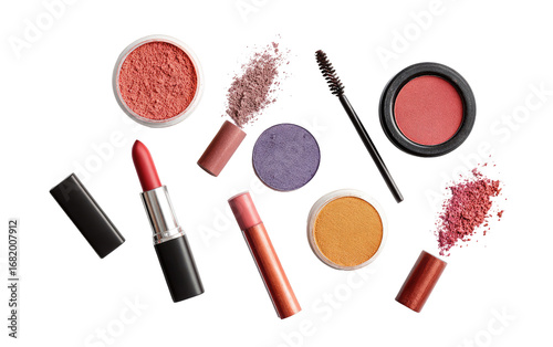 Assorted makeup products, various colors, scattered on black background