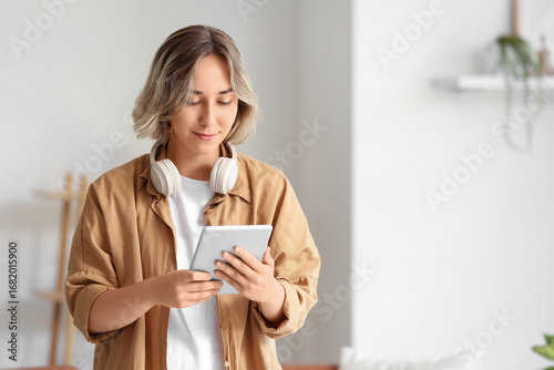 Beautiful woman using table...
