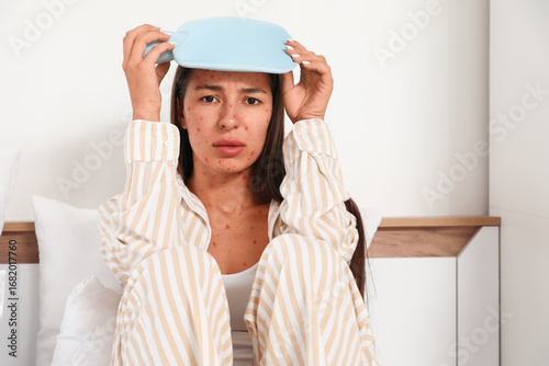 Young woman ill with chicke...