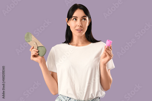 Young woman with reusable m...
