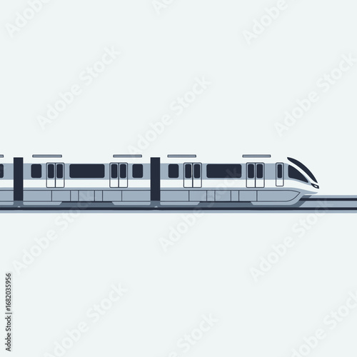 Modern train traveling on a track against a light background.