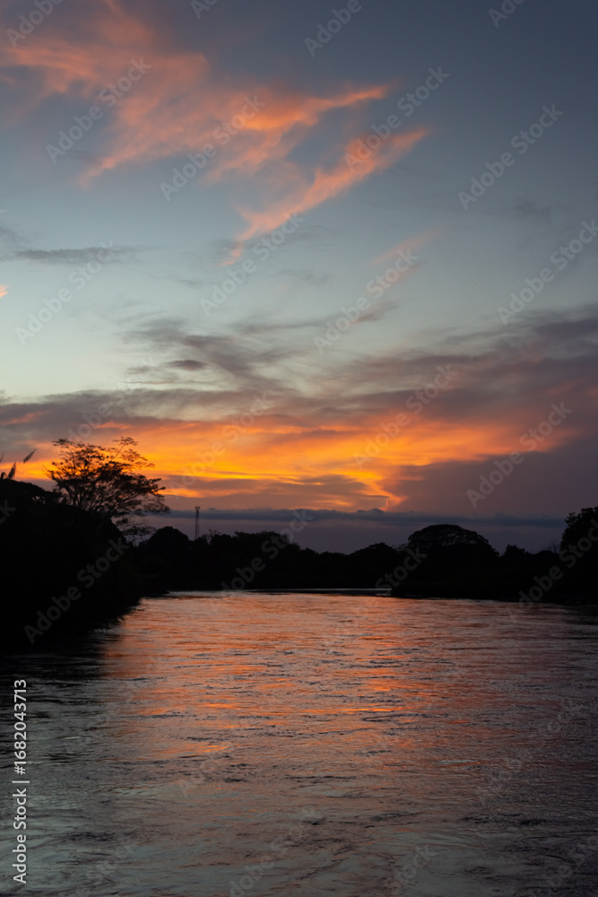 Fototapeta premium Sunset over the River in Venezuela, South America, South America