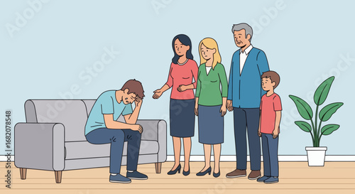 A young man sits on a couch upset while family members stand nearby looking concerned