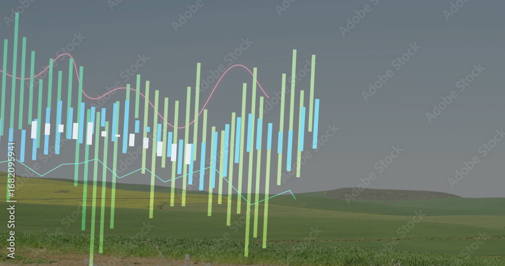 Fototapeta premium Floating translucent financial chart over rural hills and line graphs, with colorful candlesticks